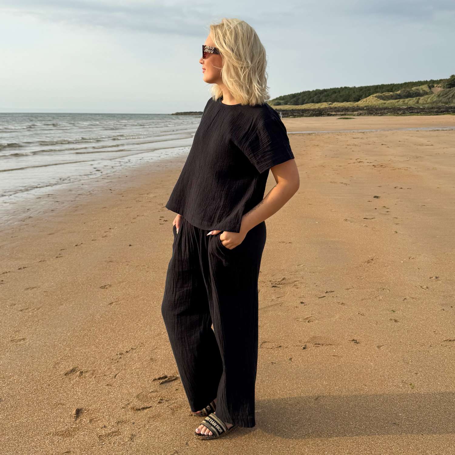 The Noor Cotton Gauze Wide-Leg Trousers - Black