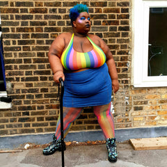 Model wearing rainbow coloured fishnets