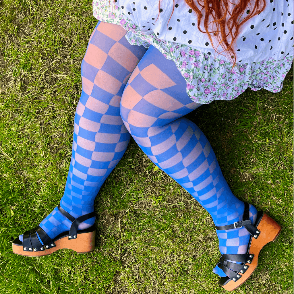 Woman wearing blue checkboard racy tights