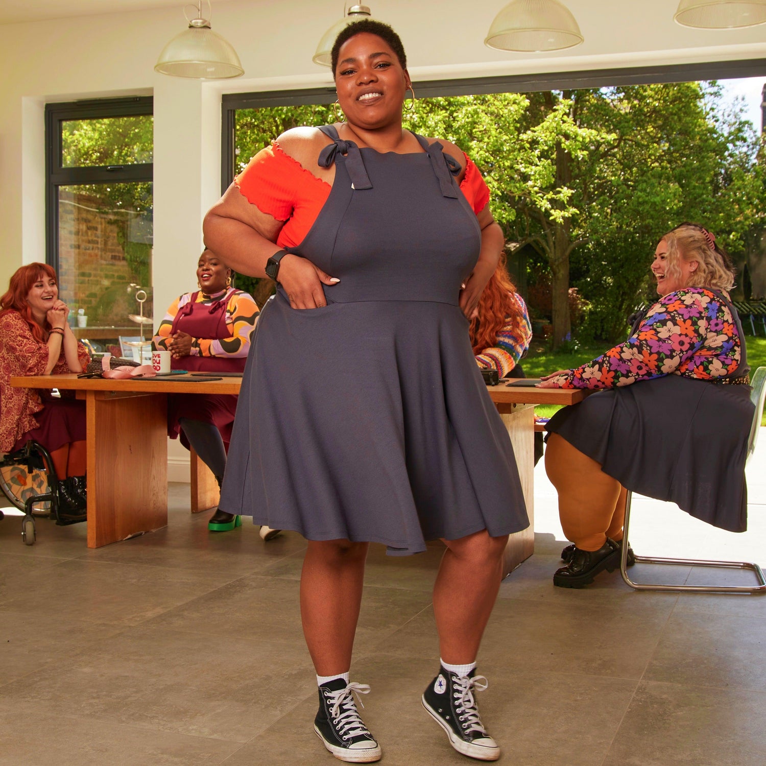 Woman wearing slate grey snagafore dress